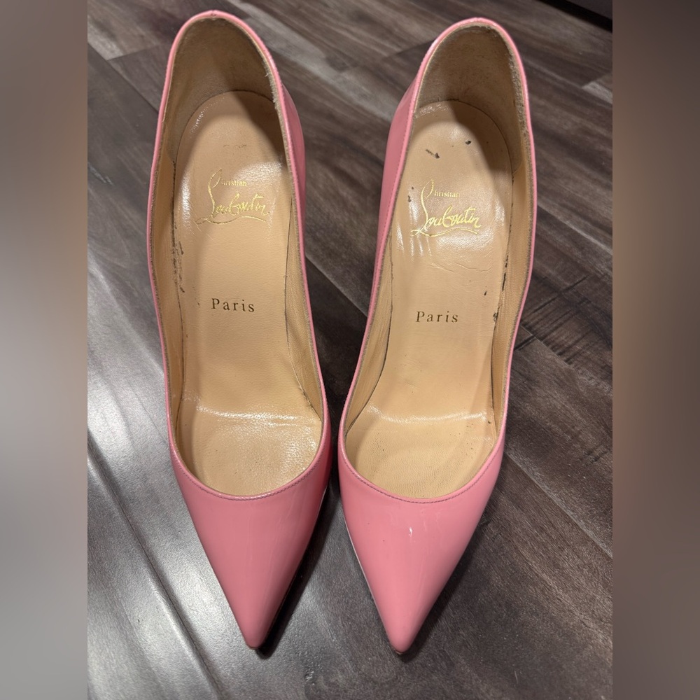 Christian Louboutin So Kate pink patent pumps